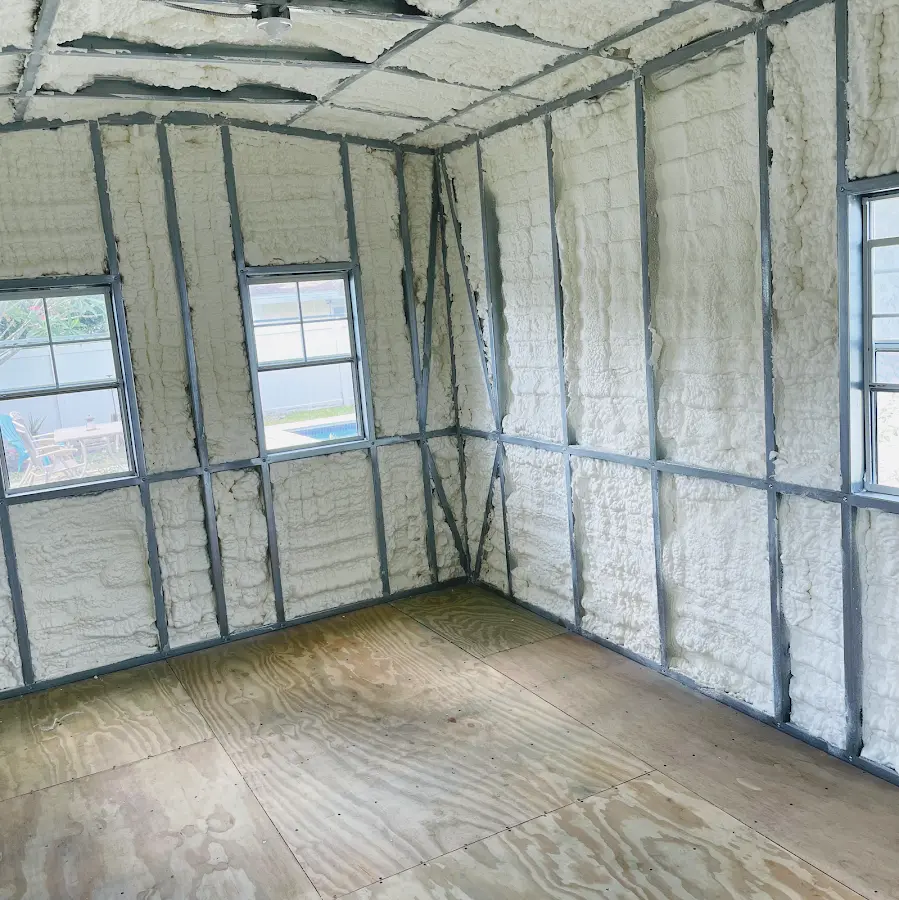 Closed-cell spray foam insulation applied to wall cavities in a residential project in Tillamook